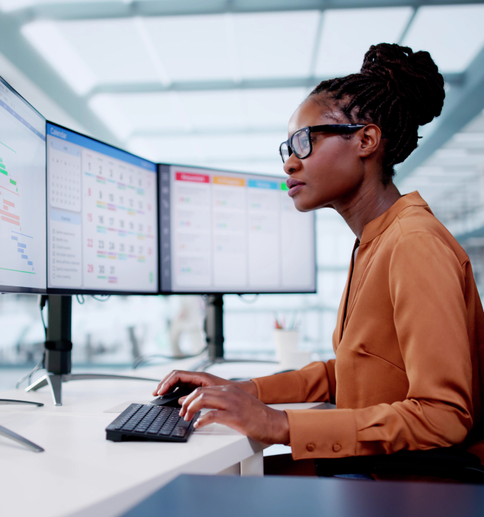 A large helicopter dropping off two people